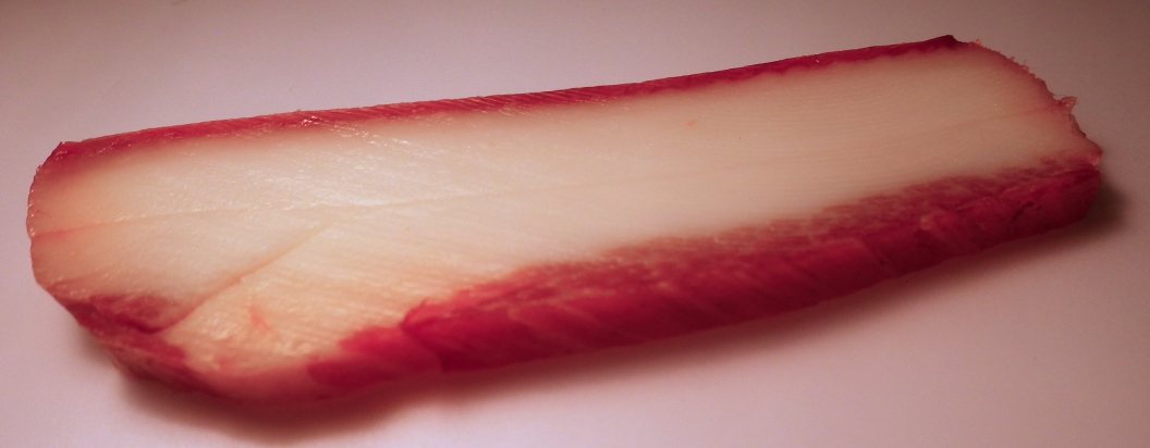 A picture of a slice of bacon.